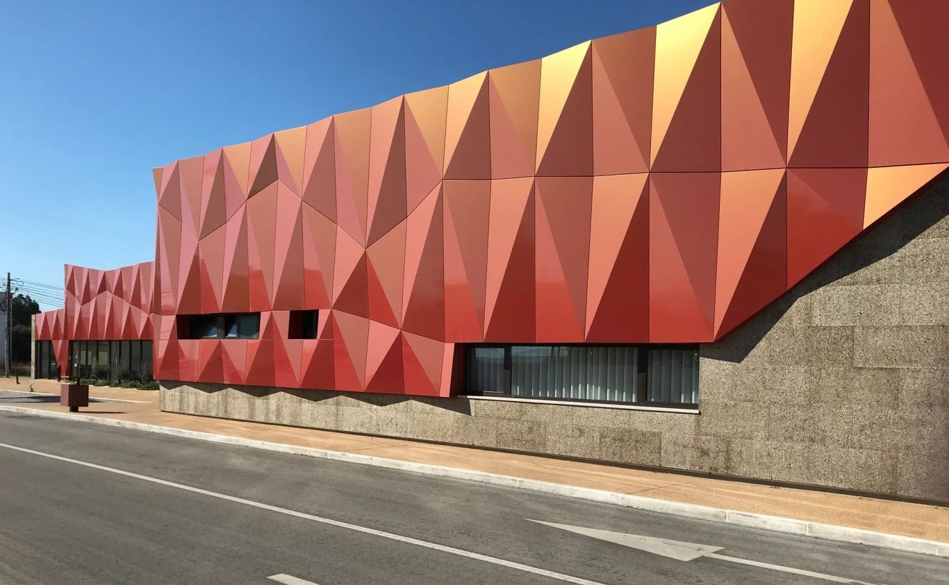 A building with a red and orange exterior.