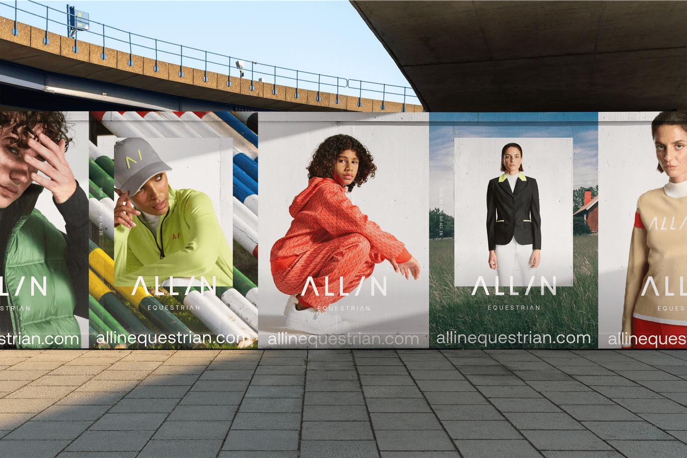 A group of people are posing in front of a billboard.